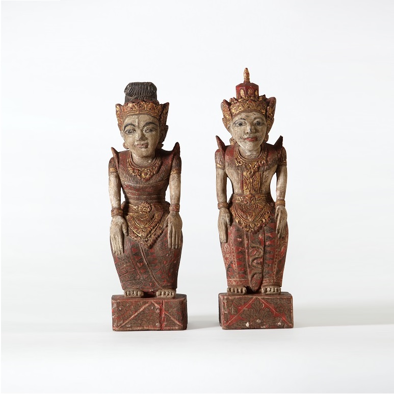 Pair of seated aristocratic figures (female and male)
