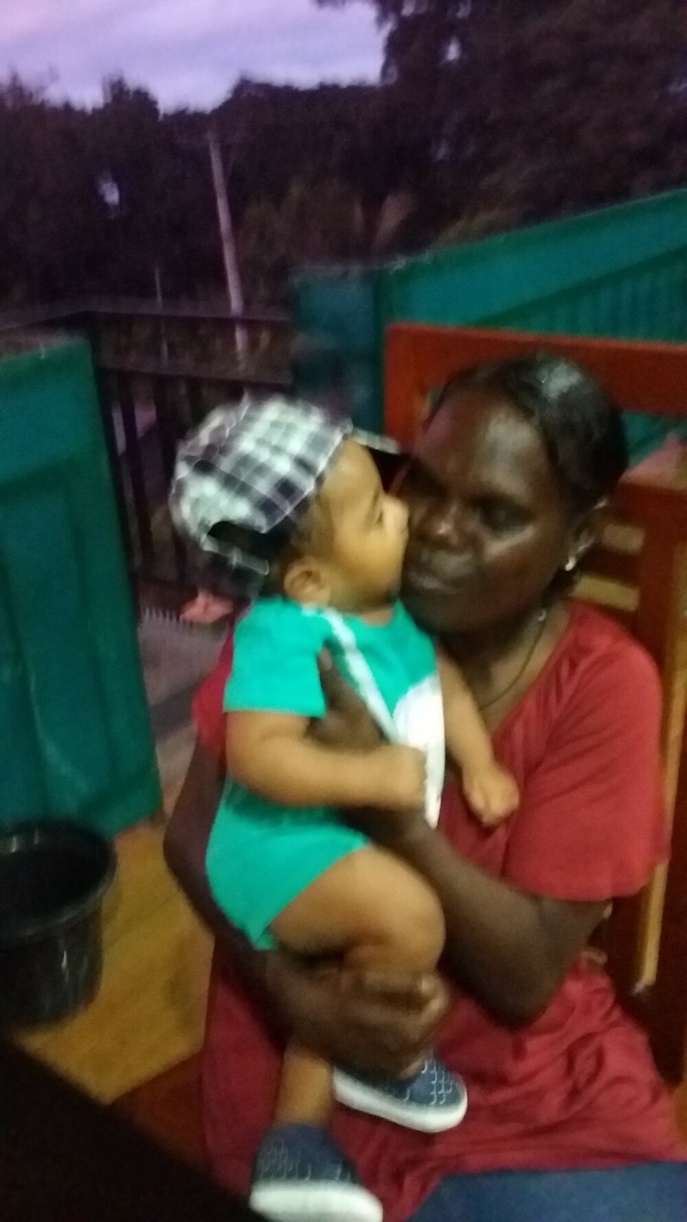 Gloria with local baby