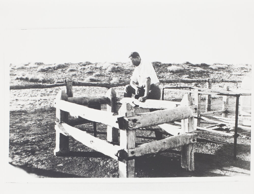 Reverend Flynn at the grave of Duncan McCauley