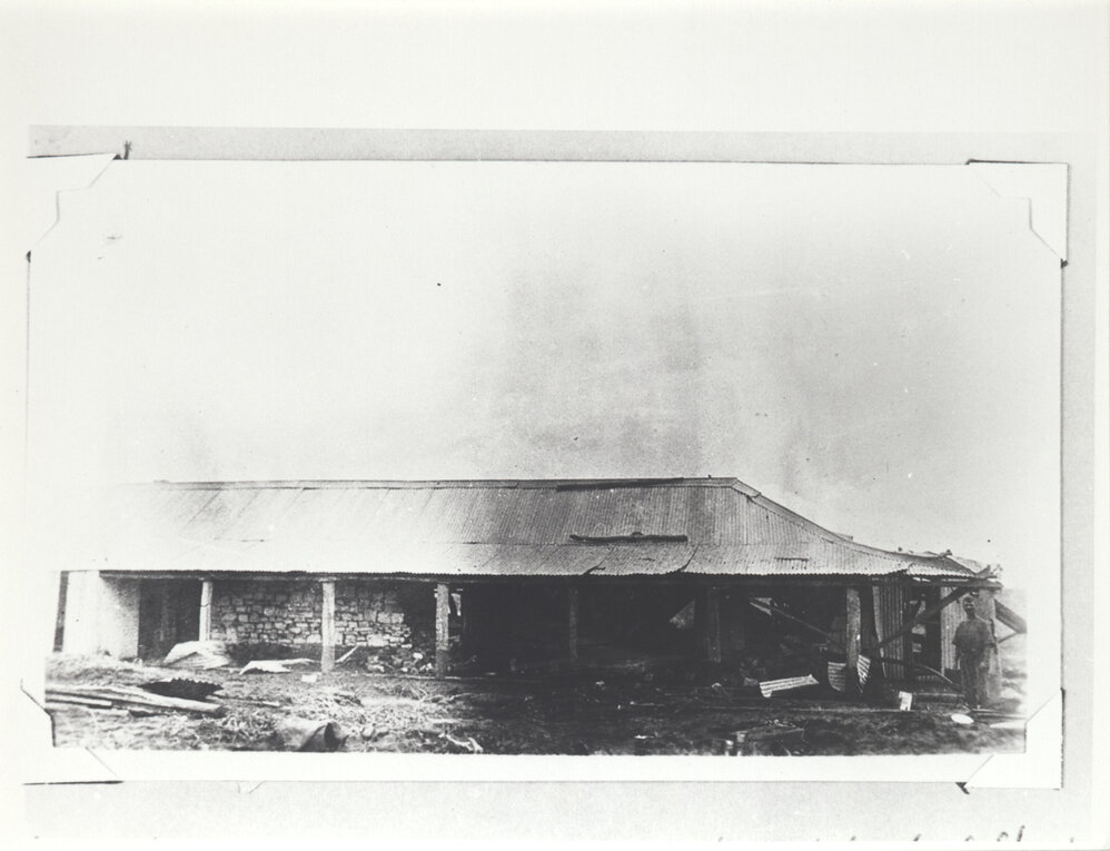 Lower Log on Homestead Roof Marks the Highest Point of Flood