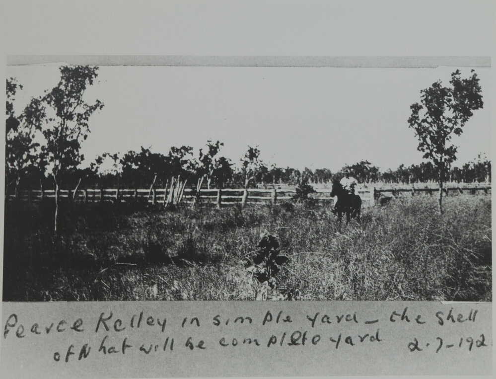 Pearce Kelley in simple yard - the shell of what will be complete yard