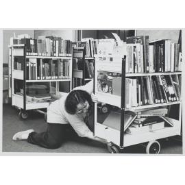 Staff move books from the old building to the new one 2