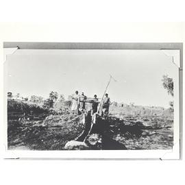 Indigenous women drawing water for the garden