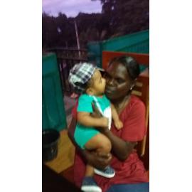 Gloria with local baby