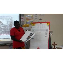 Claudette teaching in language